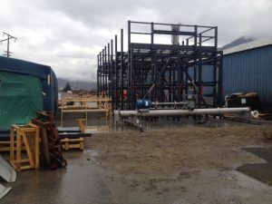 Carbon Engineering's pilot plant on a rainy day outside.